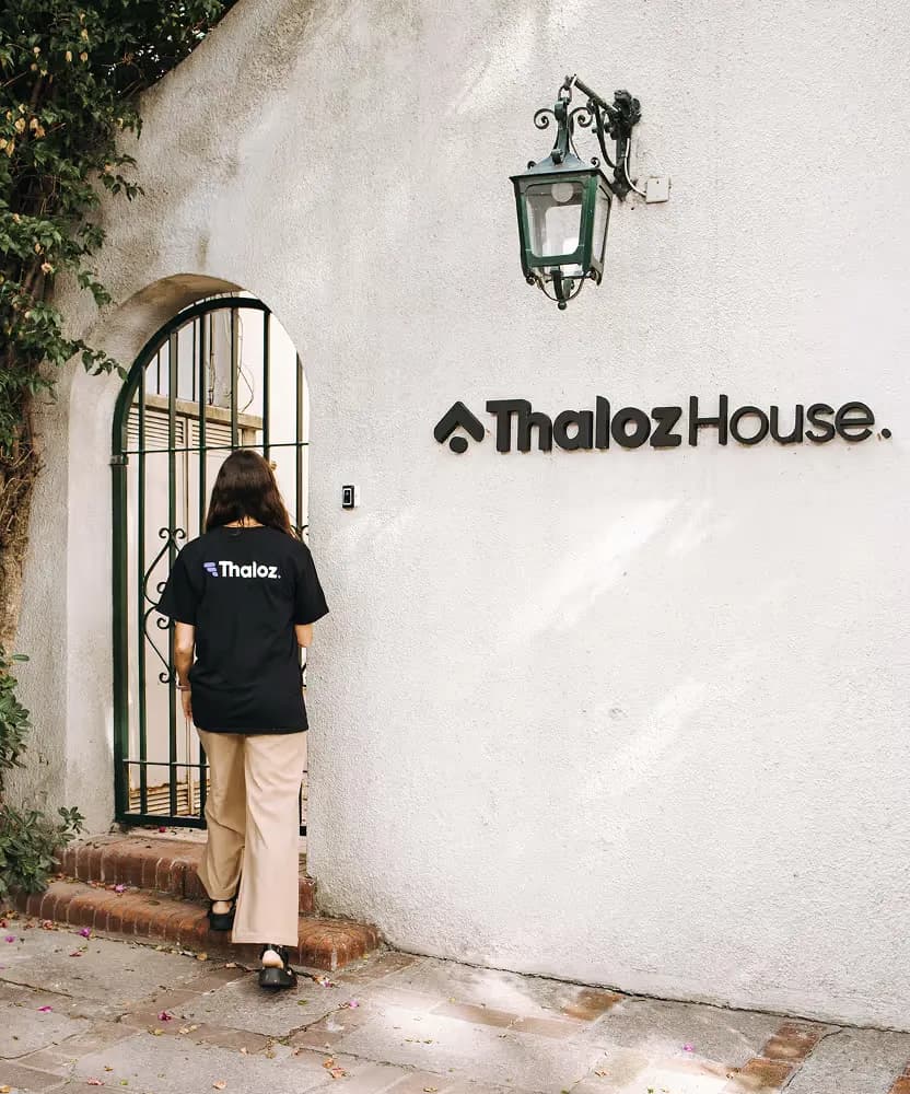 Someone walking in through the Thaloz House door in Montevideo